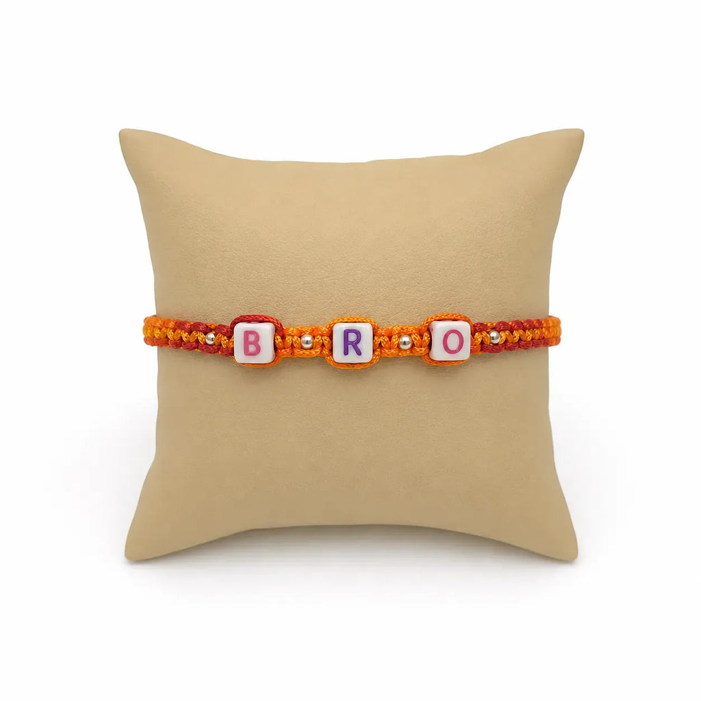 Marvel Silver BRO Letter Bead Designer Rakhi with colorful alphabet beads, silver spacer beads, and orange-red braided thread for Raksha Bandhan