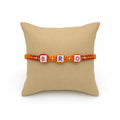 Marvel Silver BRO Letter Bead Designer Rakhi with colorful alphabet beads, silver spacer beads, and orange-red braided thread for Raksha Bandhan