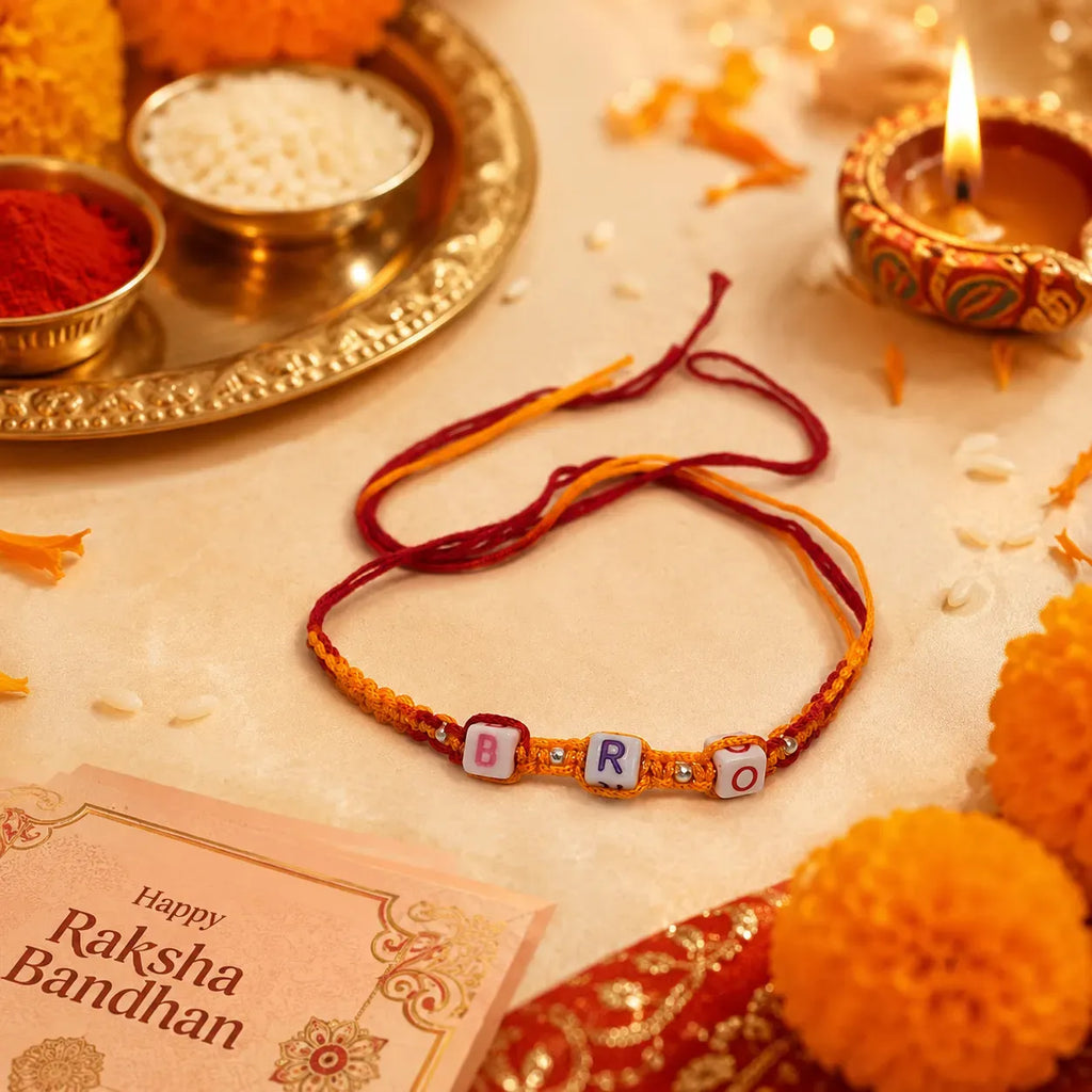 Marvel Silver BRO Letter Bead Designer Rakhi with colorful alphabet beads, silver spacer beads, and orange-red braided thread for Raksha Bandhan