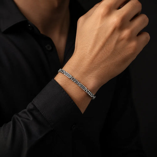 Marvel Silver black curb link bracelet for men with engraved panels and 19 cm length