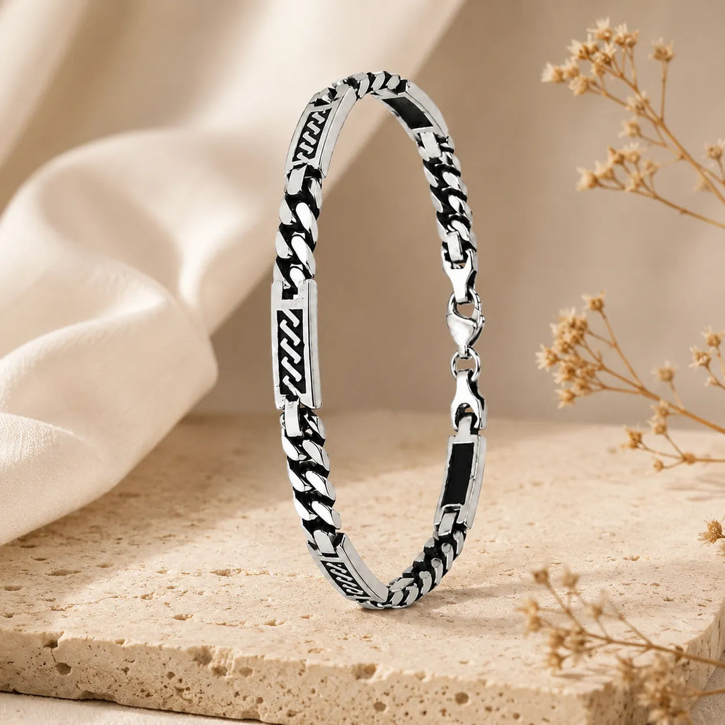 Marvel Silver black curb link bracelet for men with engraved panels and 19 cm length