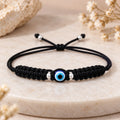 Marvel Silver black evil eye macrame adjustable bracelet with blue evil eye centerpiece and silver-tone beads