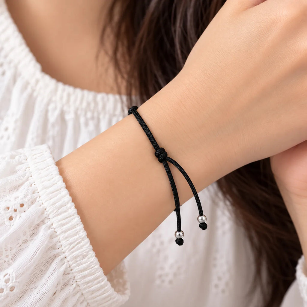 Marvel Silver black evil eye macrame adjustable bracelet with blue evil eye centerpiece and silver-tone beads