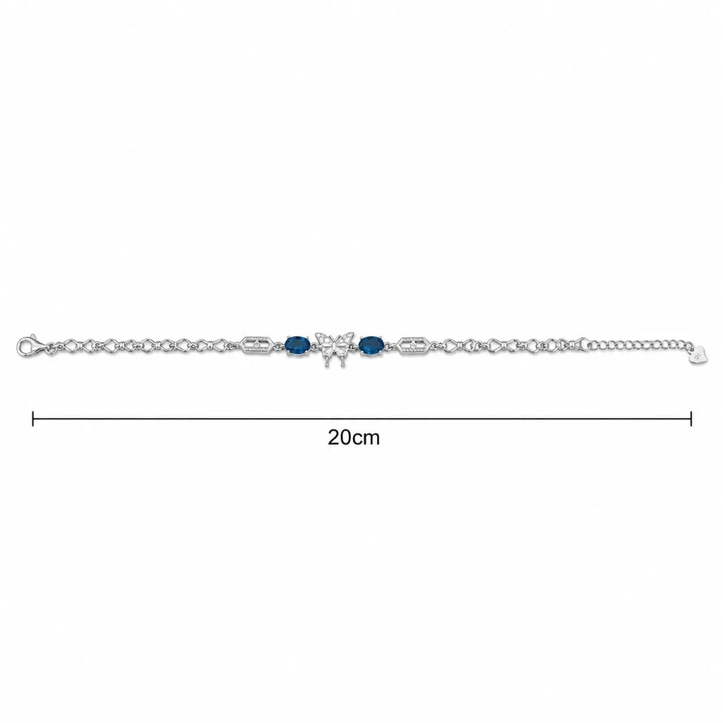 Marvel Silver 925 sterling silver bracelet featuring a sparkling butterfly centerpiece with blue gemstones, white AAA Cubic Zirconia accents, elegant heart-link chain, rhodium-plated finish, adjustable extension chain, and a stylish design for women and girls suitable for daily wear, parties, weddings, anniversaries, and gifting.