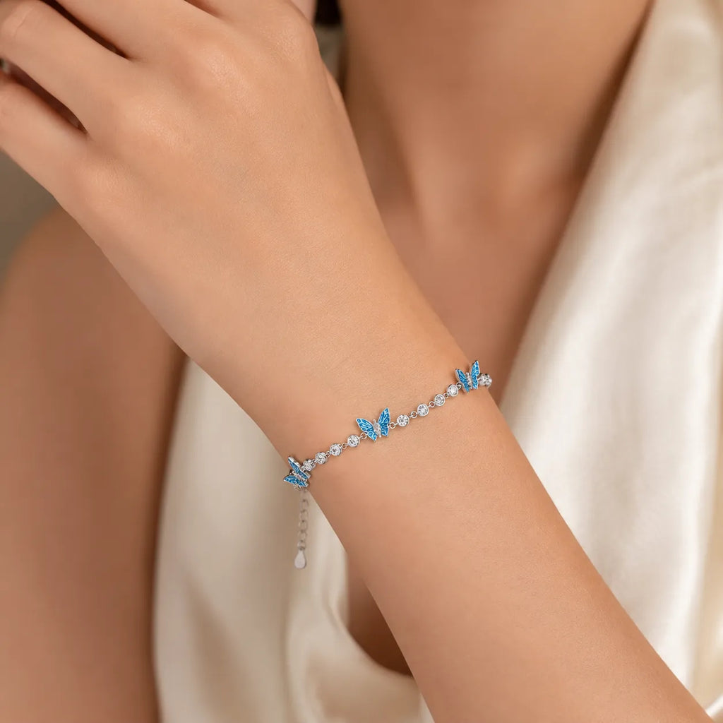 Marvel Silver blue butterfly silver bracelet for women with sparkling white stones
