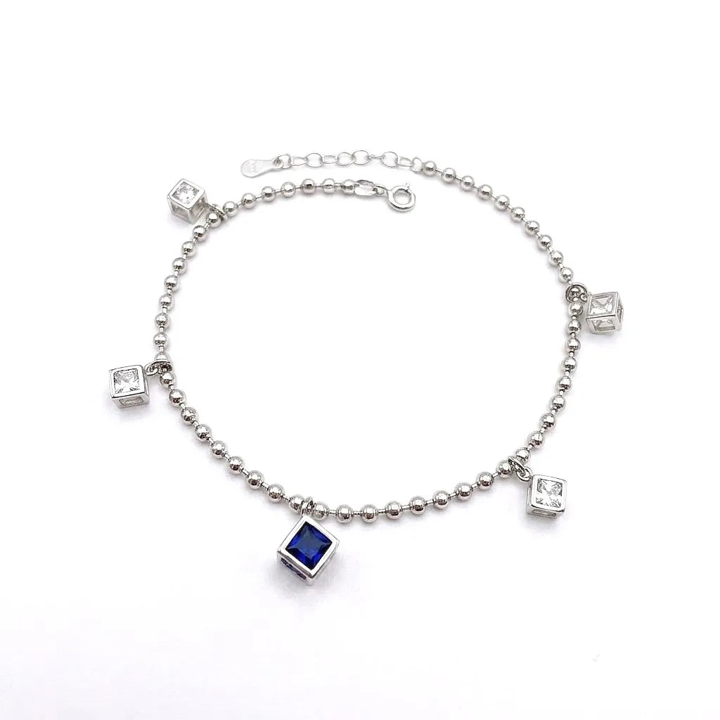 Marvel Silver Blue Crystal Anklet featuring a silver bead chain, blue crystal centerpiece, sparkling square crystal charms, and adjustable clasp for women and girls.