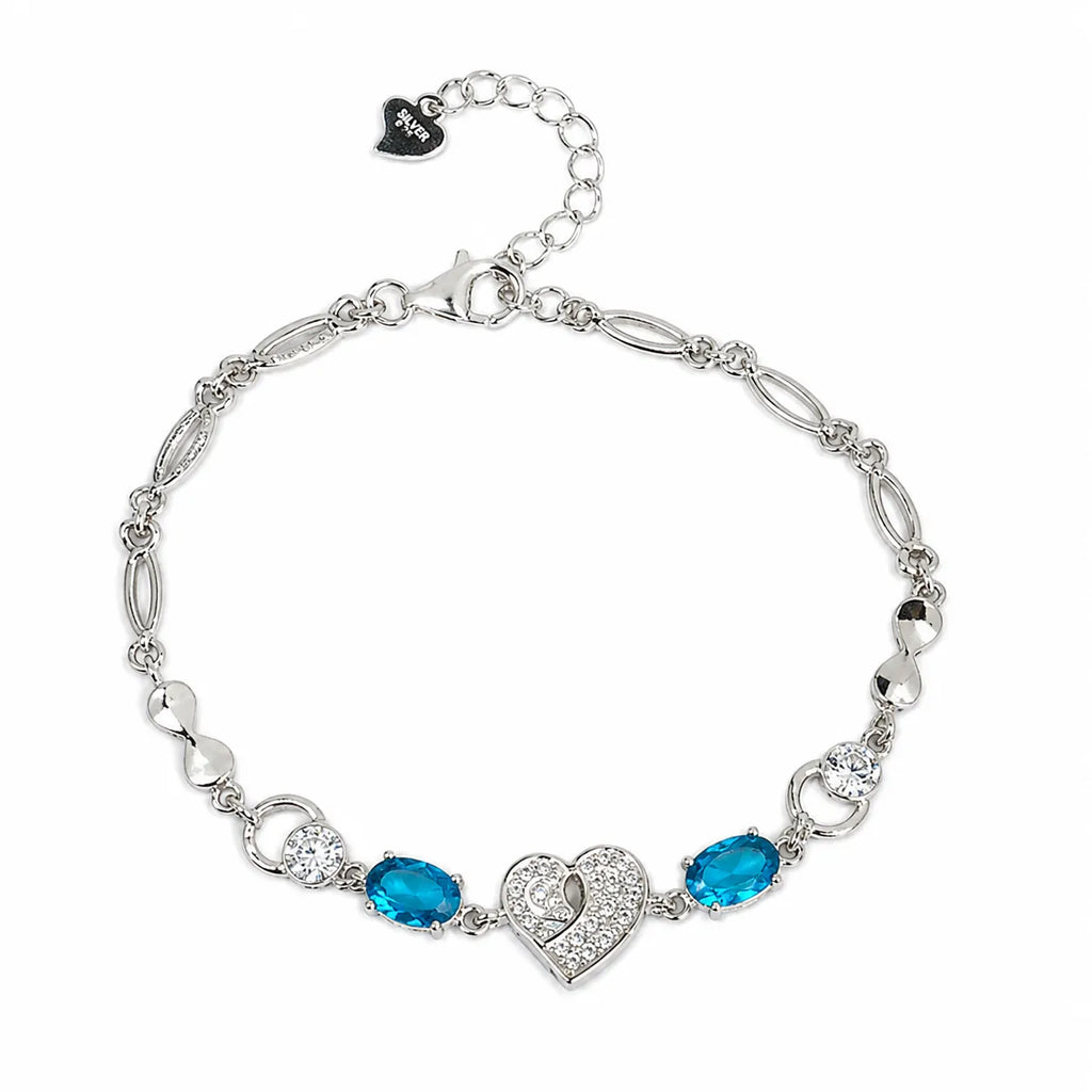Marvel Silver 925 sterling silver bracelet featuring a sparkling heart-shaped CZ centerpiece with vibrant blue gemstones and an adjustable chain, designed for women and girls, perfect for daily wear, office, parties, weddings, festive occasions, and gifting.
