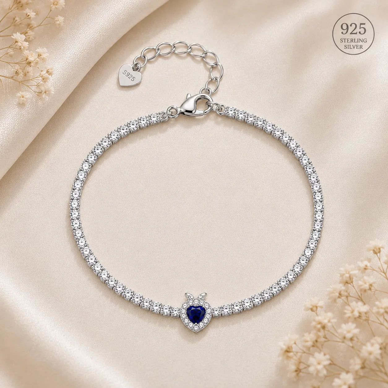 Marvel Silver 925 sterling silver tennis bracelet featuring a sparkling blue heart Cubic Zirconia centerpiece with a dazzling white stone chain, rhodium-plated finish, adjustable extension chain, elegant bracelet for women and girls suitable for daily wear, parties, weddings, anniversaries, and gifting.