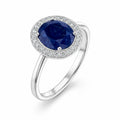 Marvel Silver blue oval stone halo silver ring for women with sparkling white stones