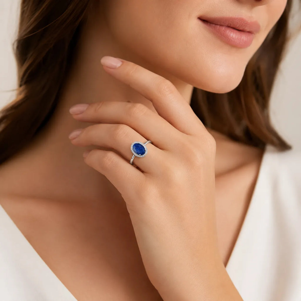 Marvel Silver blue oval stone halo silver ring for women with sparkling white stones