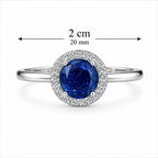 Marvel Silver blue oval stone halo silver ring for women with sparkling white stones