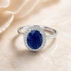 Marvel Silver blue oval stone halo silver ring for women with sparkling white stones