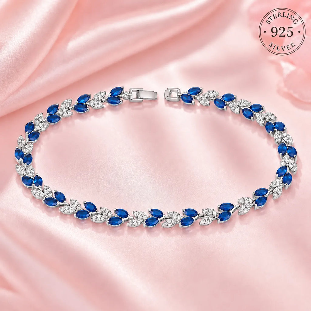 Marvel Silver blue stone leaf design silver bracelet for women with sparkling white stones