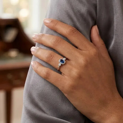 Marvel Silver blue stone silver ring for women with white side stones