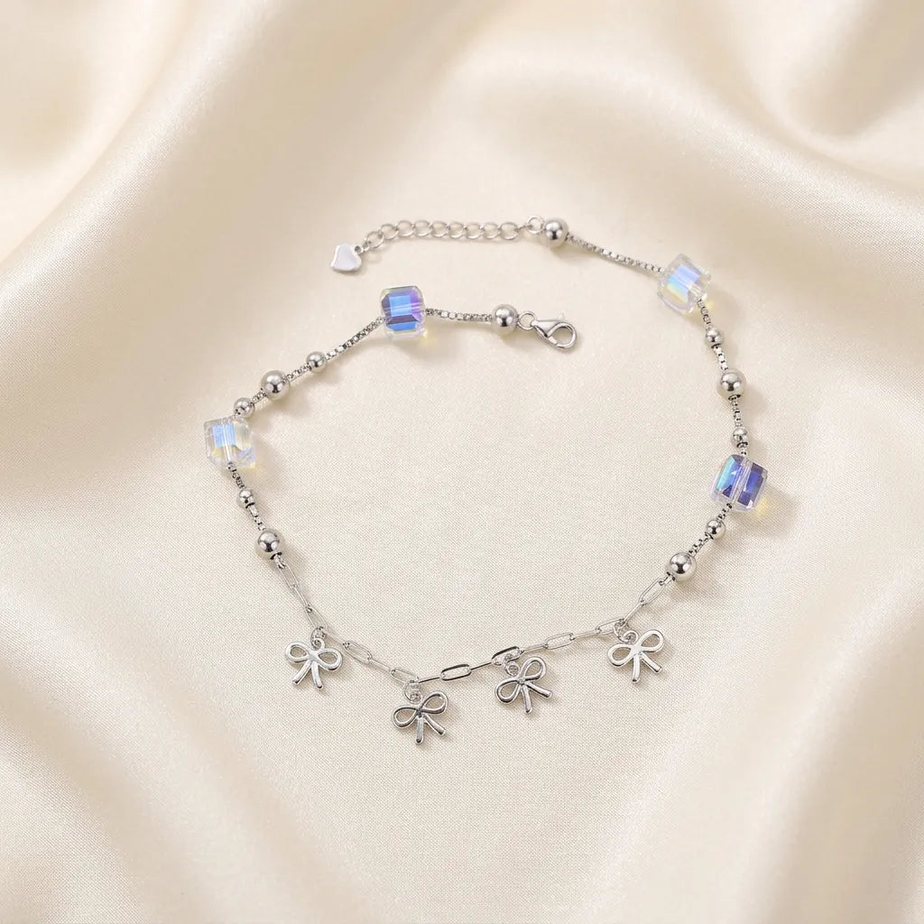 Marvel Silver Bow Charm Anklet with crystal cube beads and adjustable silver chain for women and girls.