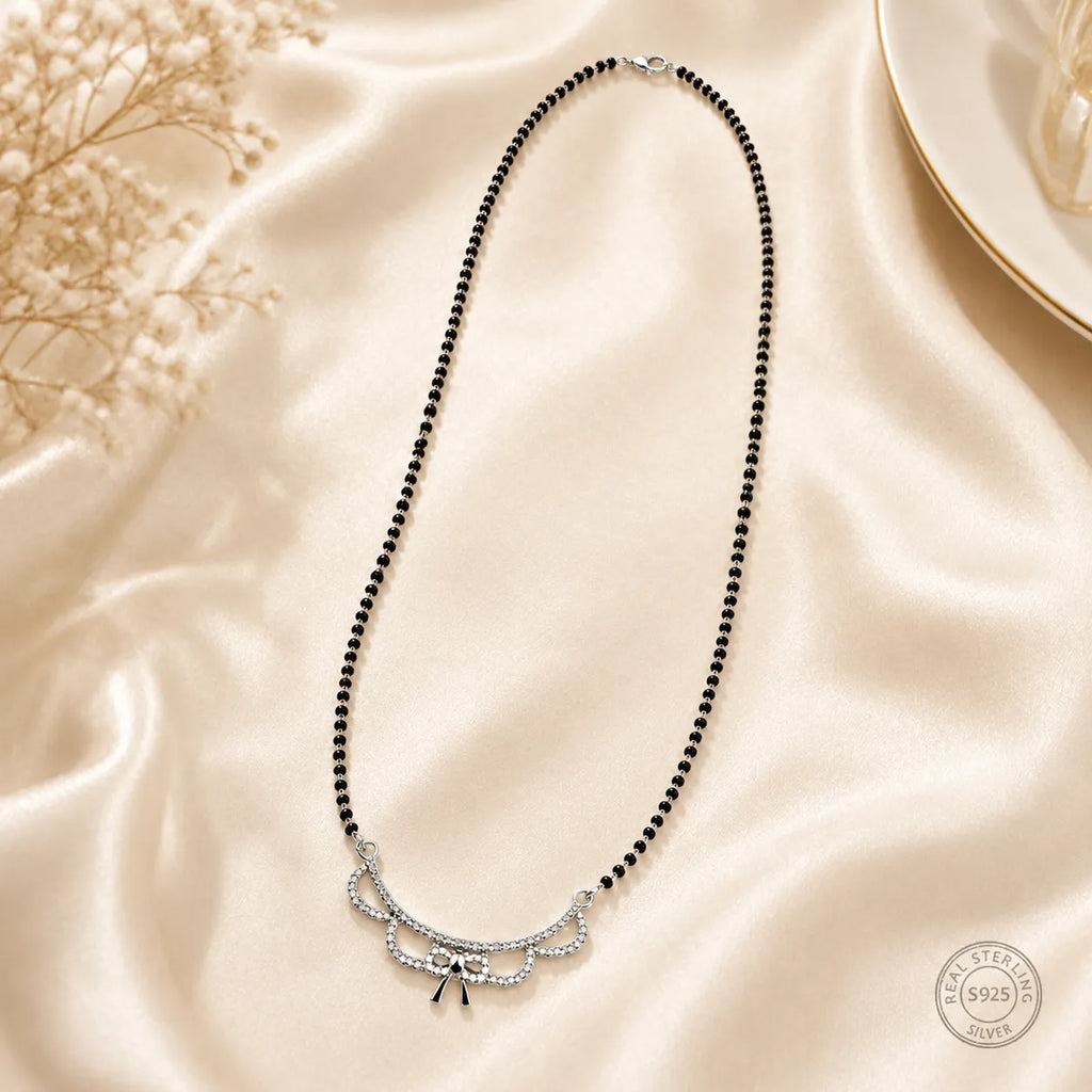 Marvel Silver bow design black beads mangalsutra for women with 4 cm pendant