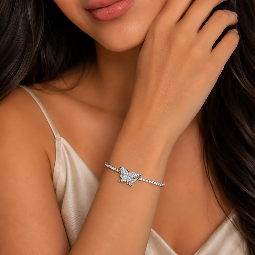 Marvel Silver 925 sterling silver tennis bracelet featuring a sparkling butterfly centerpiece with AAA Cubic Zirconia and multicolor stone accents, rhodium-plated finish, adjustable extension chain, elegant silver bracelet for women and girls suitable for daily wear, parties, weddings, anniversaries, and gifting.