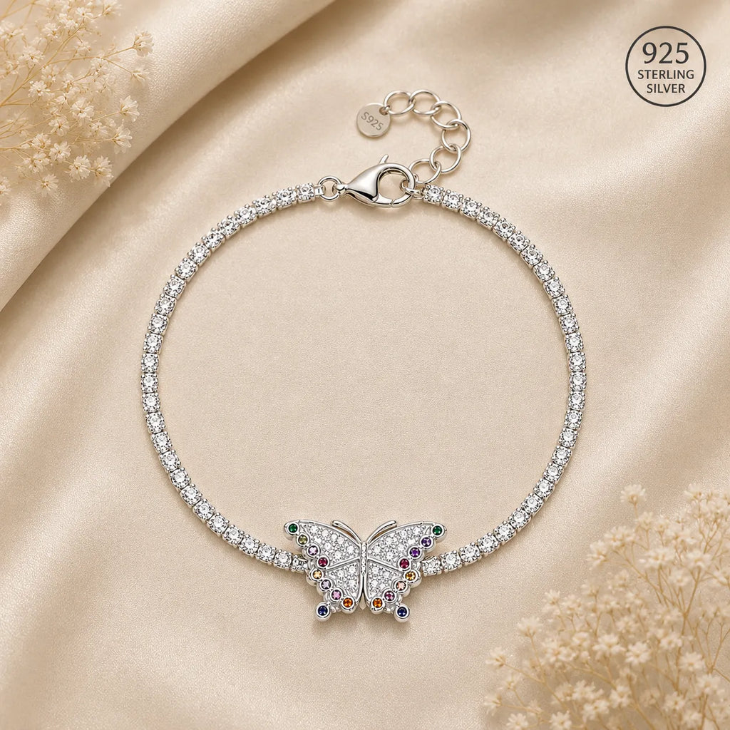 Marvel Silver 925 sterling silver tennis bracelet featuring a sparkling butterfly centerpiece with AAA Cubic Zirconia and multicolor stone accents, rhodium-plated finish, adjustable extension chain, elegant silver bracelet for women and girls suitable for daily wear, parties, weddings, anniversaries, and gifting.