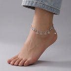 Marvel Silver Clover Charm Anklet featuring sparkling crystal cube beads, polished silver beads, dangling four-leaf clover charms, and an adjustable extension chain for women and girls.