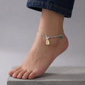 Marvel Silver Crystal Heart Anklet with sparkling teardrop crystal, green heart charm, silver bead detailing, and adjustable chain for women and girls.