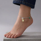 Marvel Silver Crystal Heart Anklet with sparkling teardrop crystal, green heart charm, silver bead detailing, and adjustable chain for women and girls.