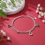 Marvel Silver Emerald Charm Anklet with green crystal charms, silver double chain, and adjustable clasp for women and girls.