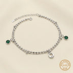 Marvel Silver Emerald Charm Anklet with green crystal charms, silver double chain, and adjustable clasp for women and girls.