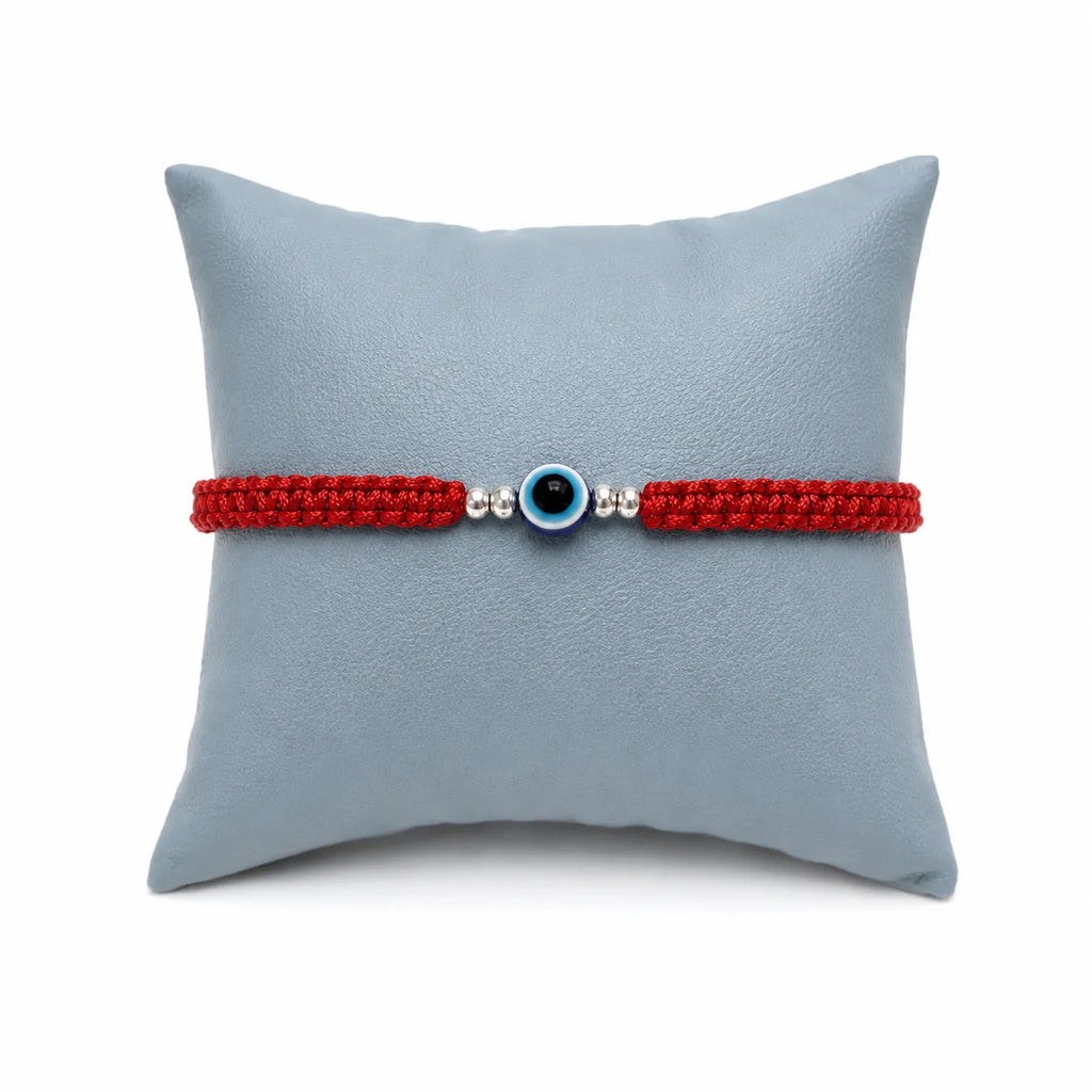 Marvel Silver red braided evil eye rakhi for brother with blue eye bead and silver-tone spacers