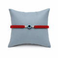 Marvel Silver red braided evil eye rakhi for brother with blue eye bead and silver-tone spacers