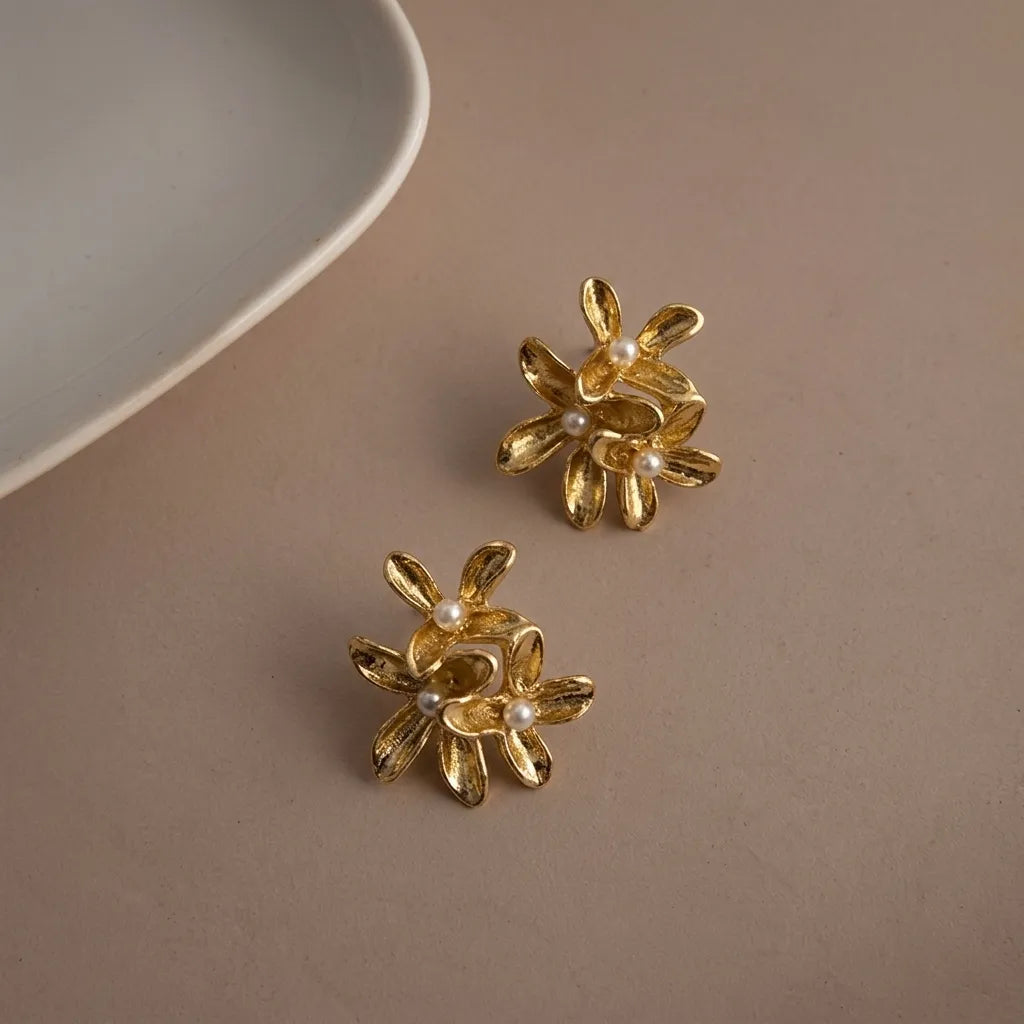 Marvel Silver gold floral imitation stud earrings with elegant pearl accents and premium gold-plated finish for women.