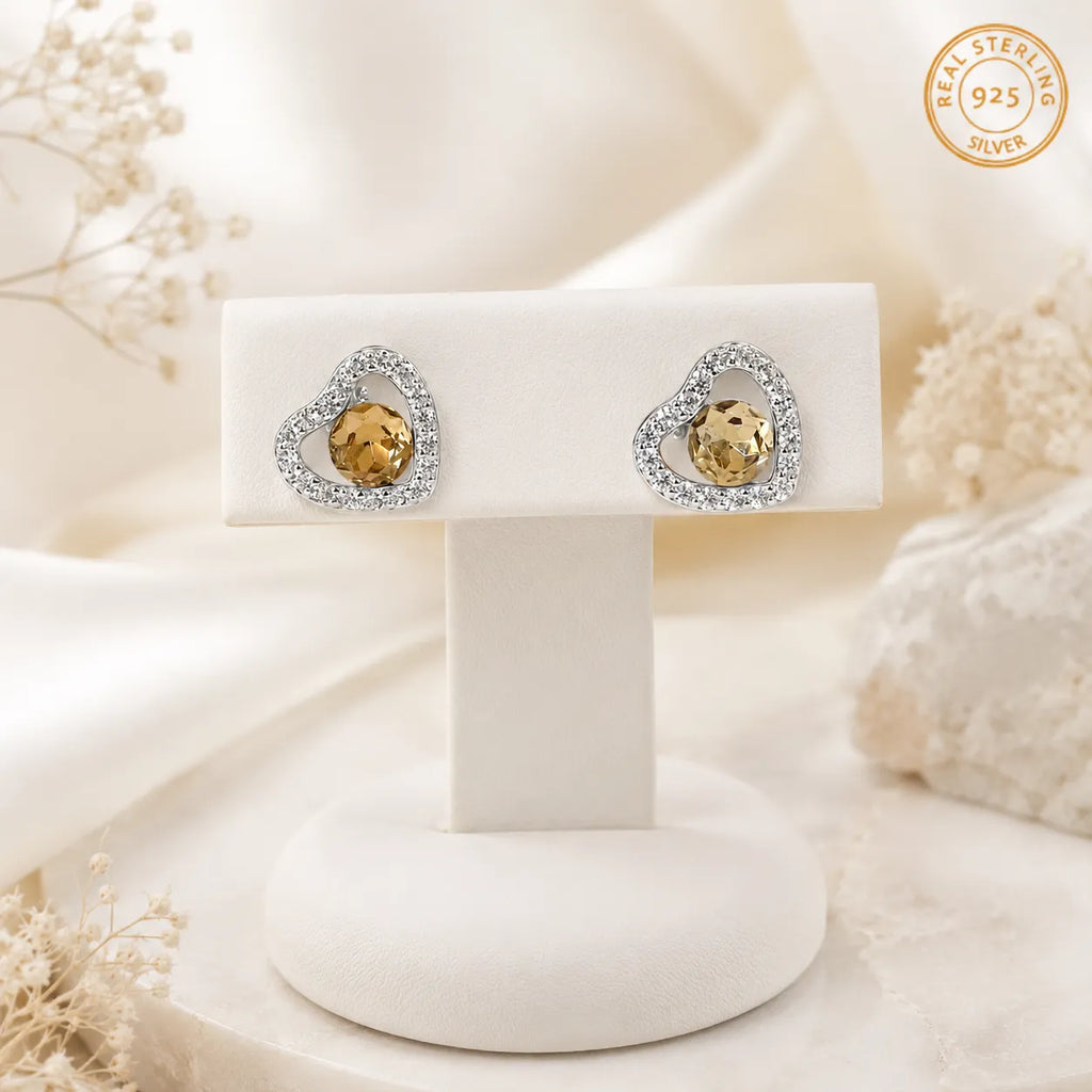 Marvel Silver golden stone heart design earrings for women with crystal detailing