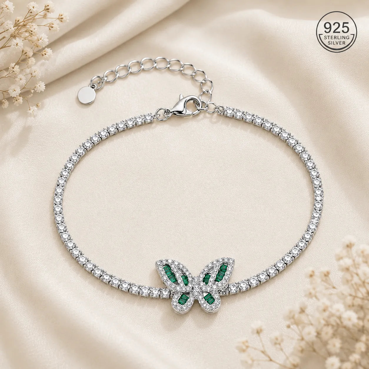 Marvel Silver 925 sterling silver tennis bracelet featuring a sparkling butterfly charm with green and white Cubic Zirconia stones, adjustable chain, elegant silver finish, designed for women and girls, perfect for daily wear, parties, weddings, festive occasions, and gifting.