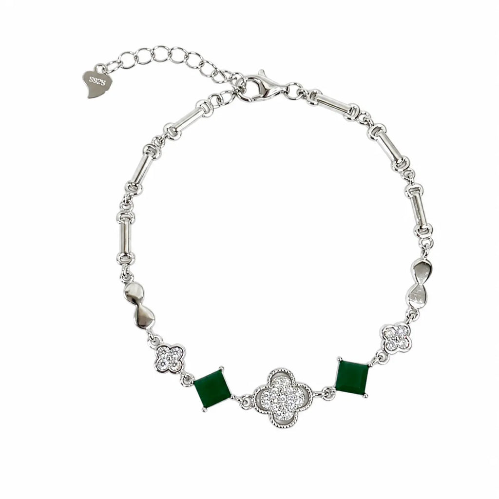 Marvel Silver 925 sterling silver bracelet featuring sparkling CZ clover charms, emerald-green square stones, and an adjustable chain, designed for women and girls, perfect for daily wear, office, parties, weddings, festive occasions, and gifting.
