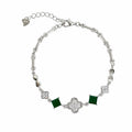Marvel Silver 925 sterling silver bracelet featuring sparkling CZ clover charms, emerald-green square stones, and an adjustable chain, designed for women and girls, perfect for daily wear, office, parties, weddings, festive occasions, and gifting.