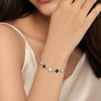 Marvel Silver 925 sterling silver bracelet featuring sparkling CZ clover charms, emerald-green square stones, and an adjustable chain, designed for women and girls, perfect for daily wear, office, parties, weddings, festive occasions, and gifting.