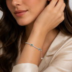 Marvel Silver green stone silver tennis bracelet for women with sparkling white stones