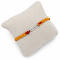 Marvel Silver infinity design rakhi for brother with yellow red braided thread and silver-tone stone-studded infinity charm