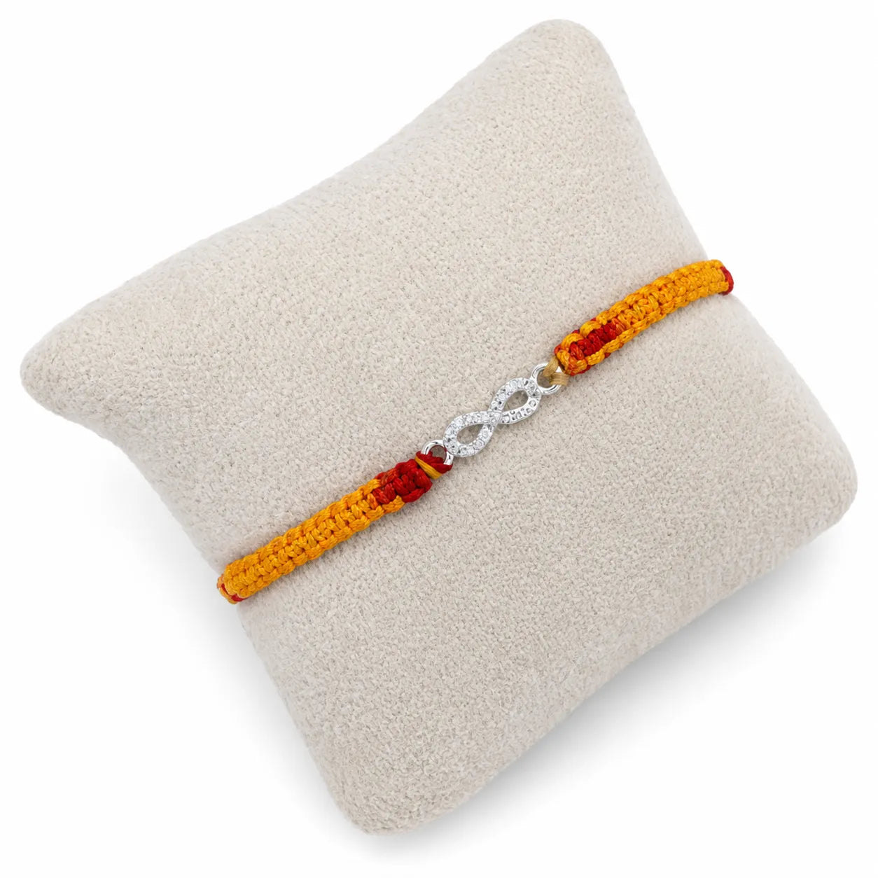 Marvel Silver infinity design rakhi for brother with yellow red braided thread and silver-tone stone-studded infinity charm