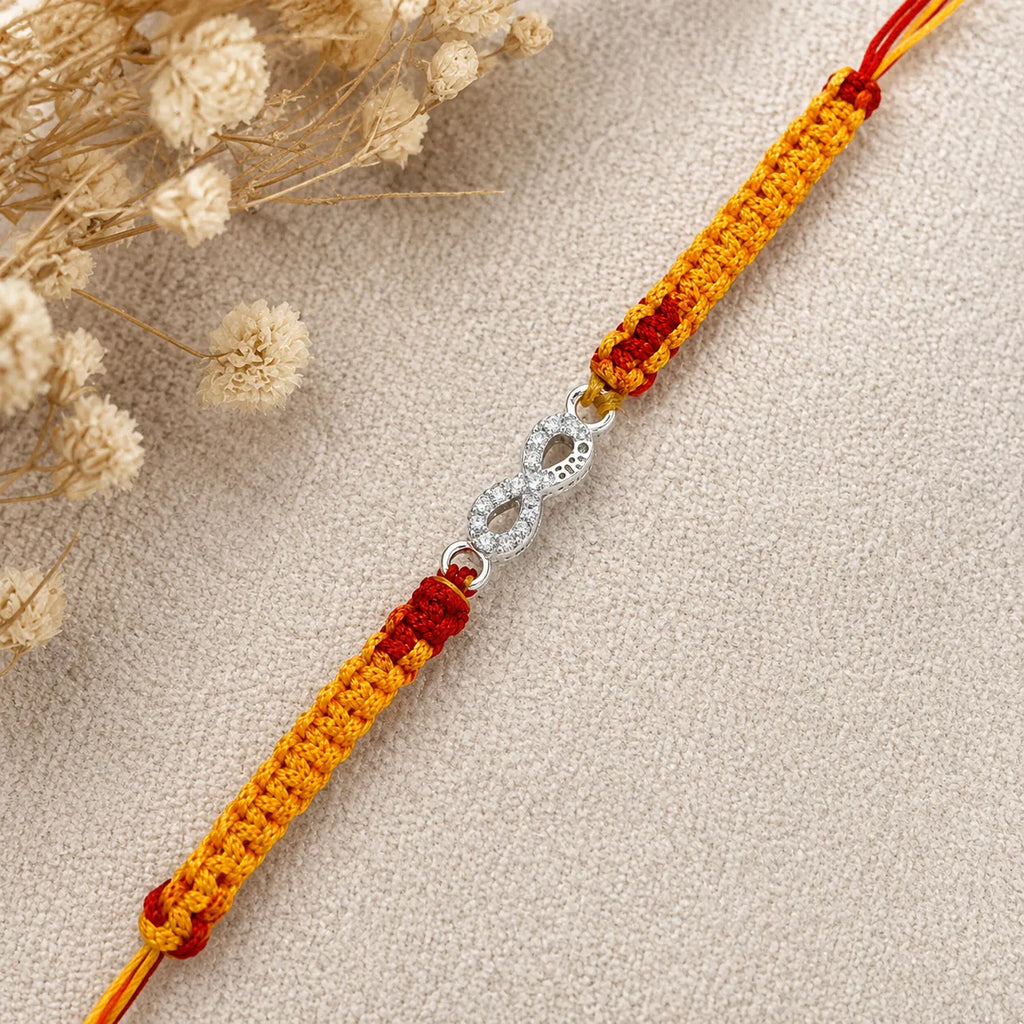 Marvel Silver infinity design rakhi for brother with yellow red braided thread and silver-tone stone-studded infinity charm