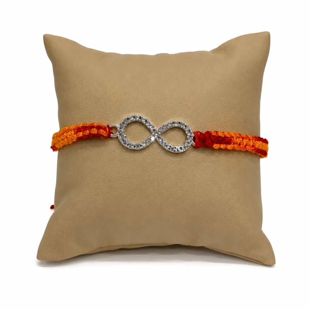 Marvel Silver infinity design rakhi for brother with yellow red braided thread and silver-tone stone-studded infinity charm