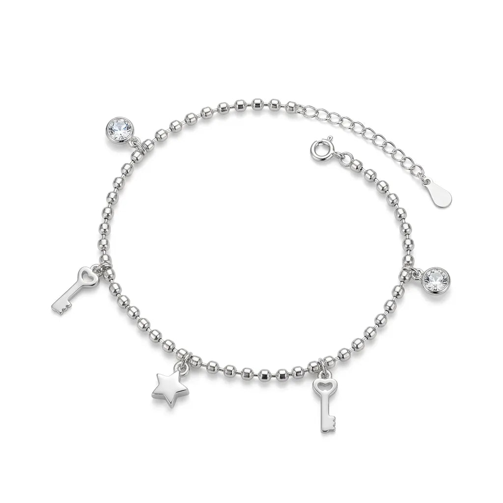 Marvel Silver Key Charm Anklet with polished silver bead chain, sparkling crystal accents, key charms, star charm, and adjustable extension chain for women and girls.