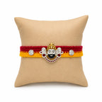 Marvel Silver Khatu Shyam Ji silver rakhi with premium designer silver charm, sparkling stone accents, and handcrafted red and yellow cotton thread for Raksha Bandhan.