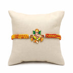 Marvel Silver Lord Ganesha Silver Rakhi with Orange and Yellow Woven Thread