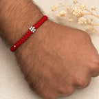 Marvel Silver minimal floral red thread rakhi for brother with silver-tone bead centre and accents