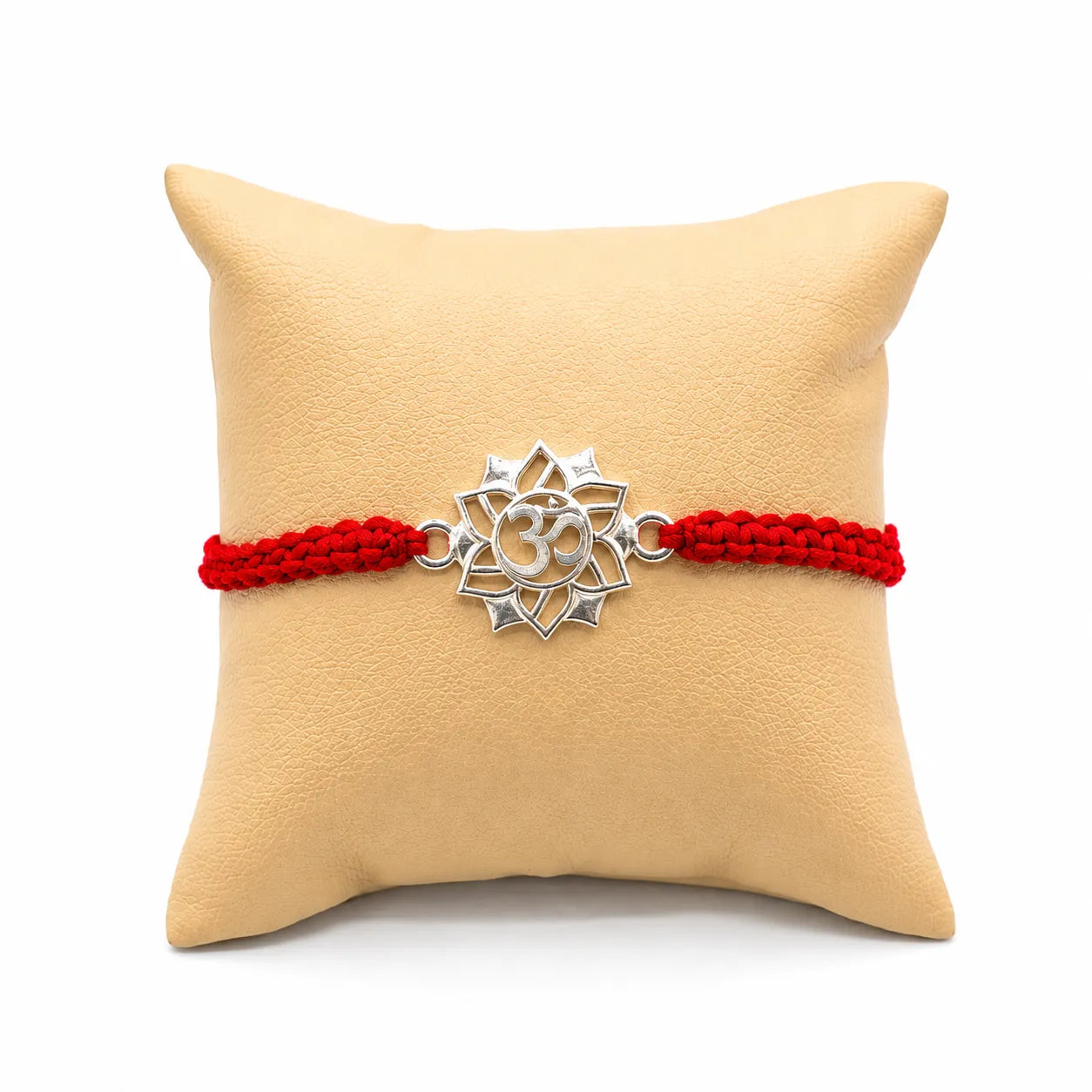 Marvel Silver Om Lotus Rakhi with silver finish Om symbol and blue yellow handcrafted thread for Raksha Bandhan.