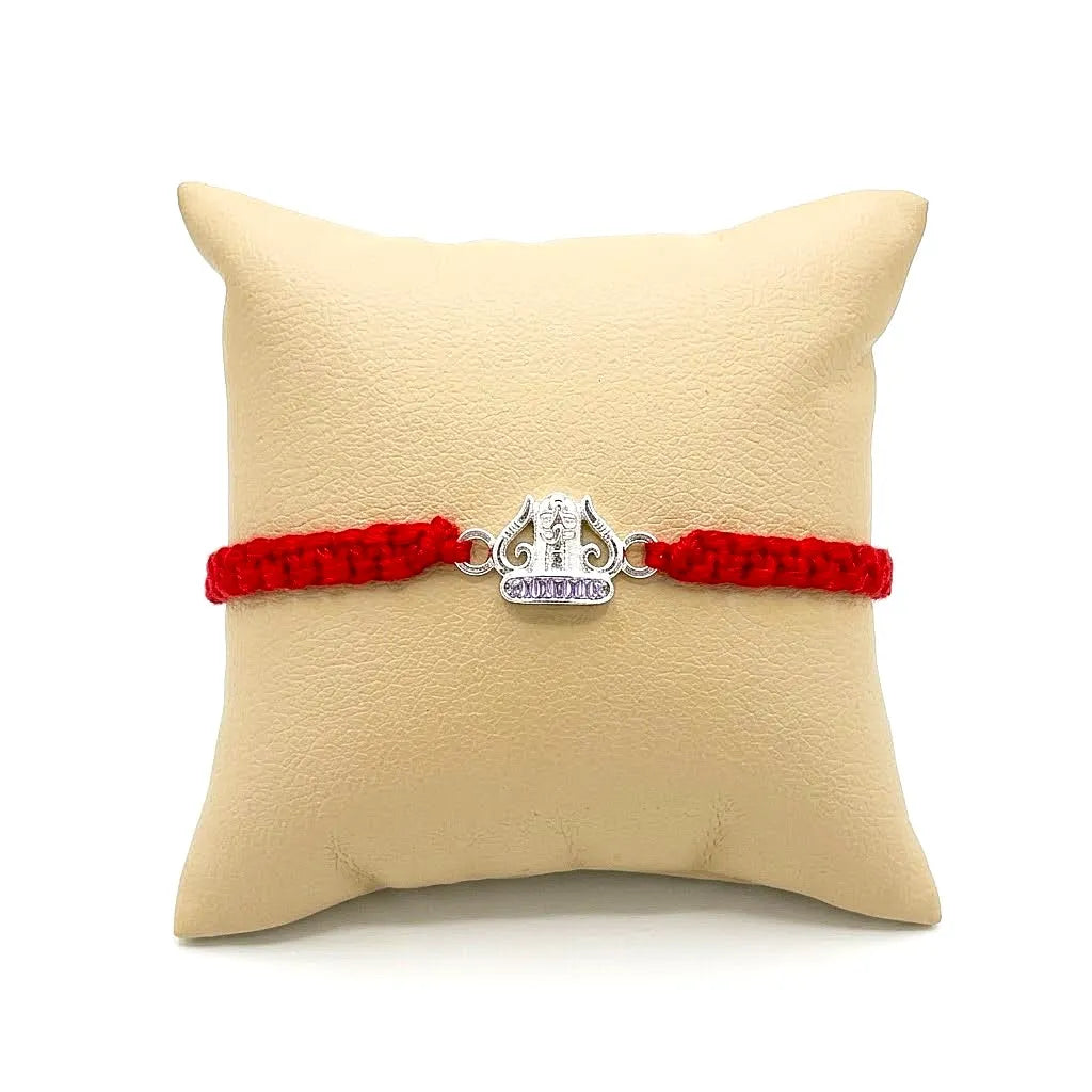 Marvel Silver Om Rakhi featuring a silver-finish Om symbol charm on a handcrafted red thread for Raksha Bandhan celebrations.