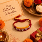 Silver Om Rakhi for Brother with Red & Yellow Thread