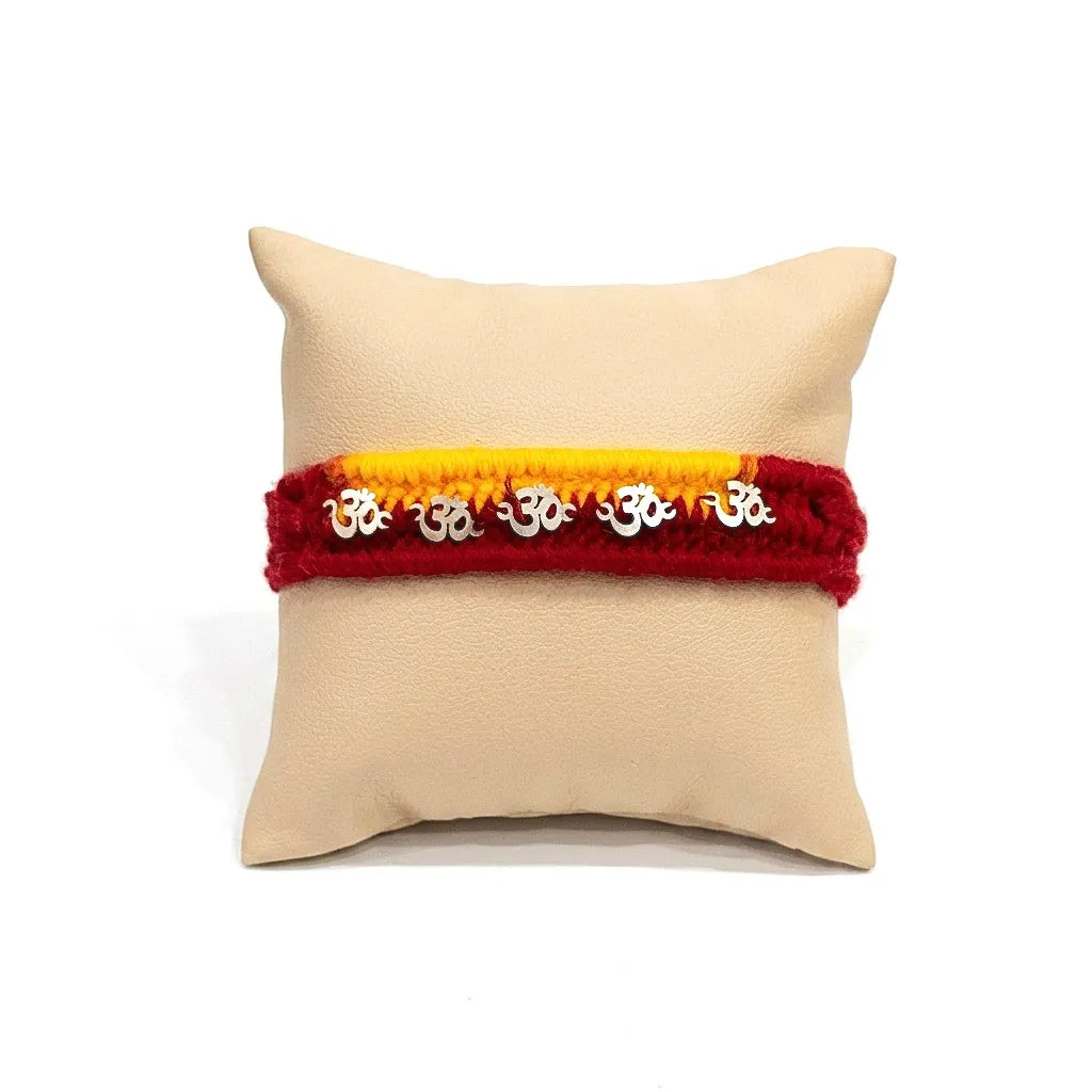 Silver Om Rakhi for Brother with Red & Yellow Thread