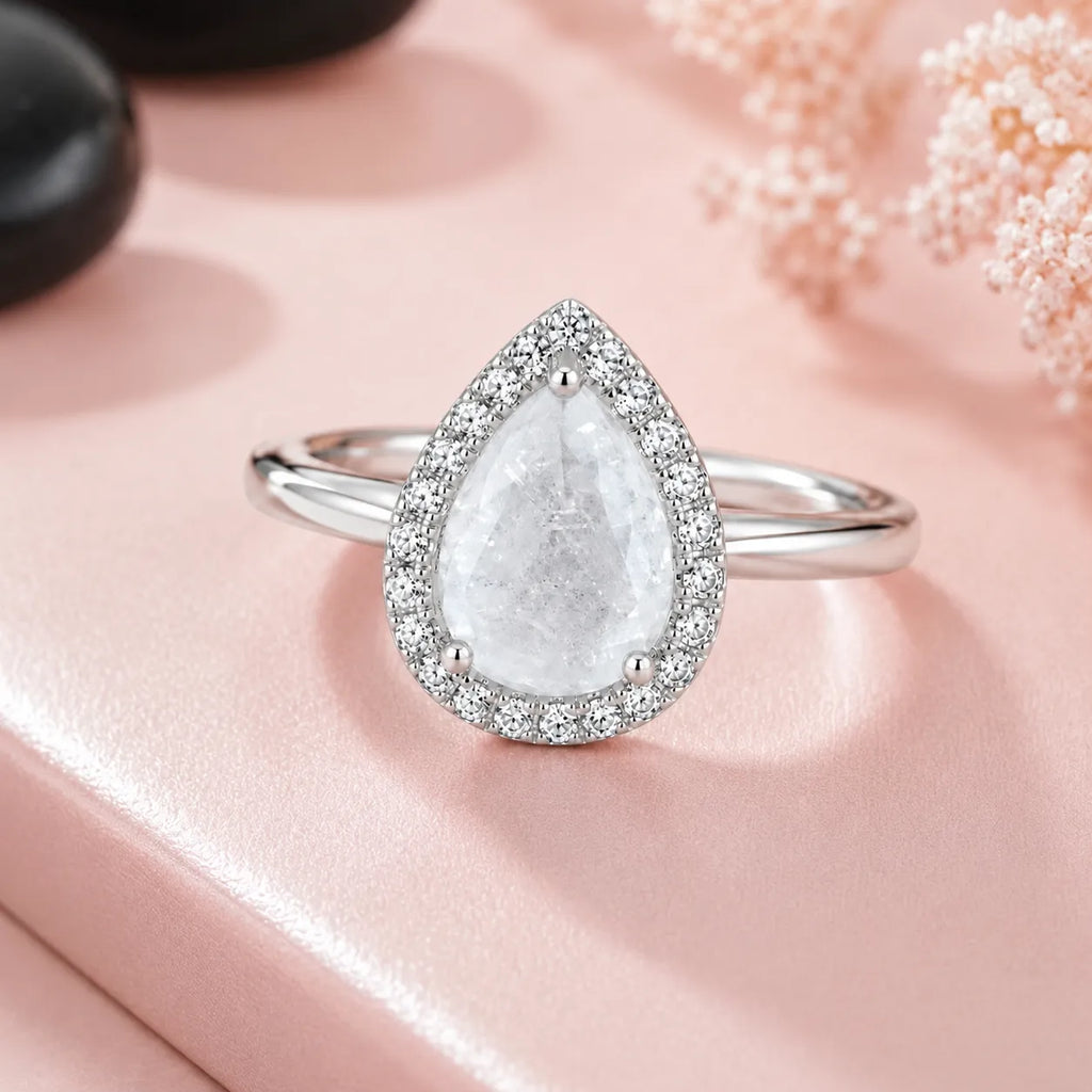 Marvel Silver pear shape white stone silver ring for women with sparkling halo design