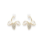 Marvel Silver pearl leaf designer imitation stud earrings with CZ stones, enamel leaves, and premium gold-plated finish for women.